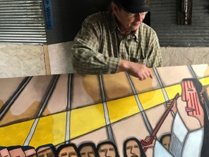 Dwayne Wilcox Turns in Artwork for The Gift